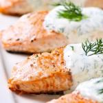 Fillet of pink salmon in the oven with cheese